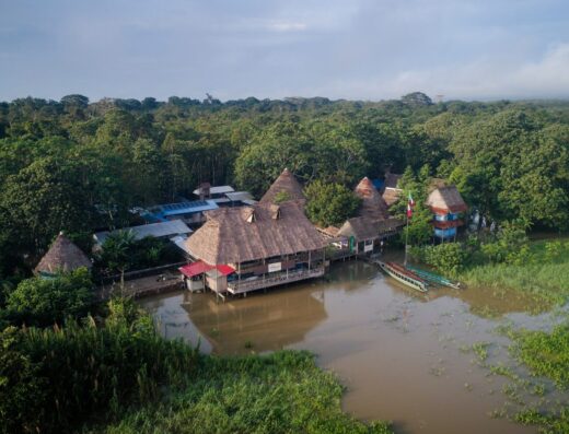 Ayahuasca retreat center: Large bamboo structures on stilts, sitting on the edge of the Amazon River and Rainforest